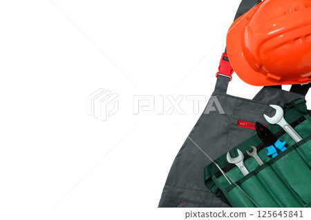 Safety gear and tools represent Labor Day for hardworking Americans, isolated on white Safety gear and tools represent Labor Day for hardworking Americans, isolated on white 125645841
