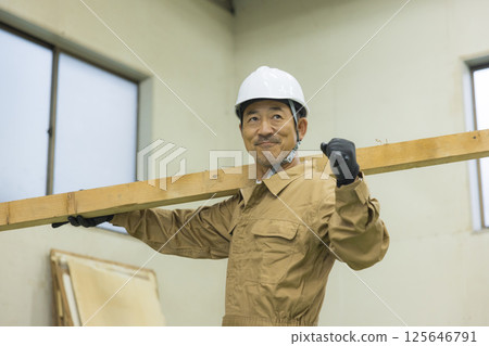 Workers working at a demolition site Workers working at a demolition site 125646791