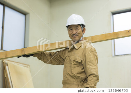 Workers working at a demolition site Workers working at a demolition site 125646793