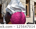 Colorful ice cream objects and building walls 125647014
