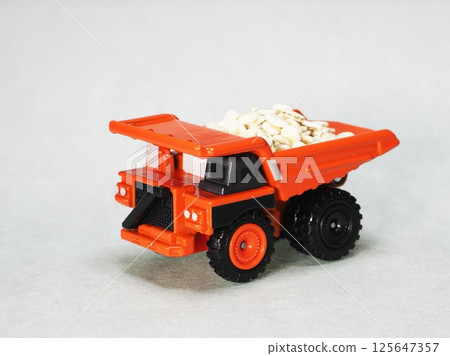 Dump truck carrying rolled barley Dump truck carrying rolled barley 125647357