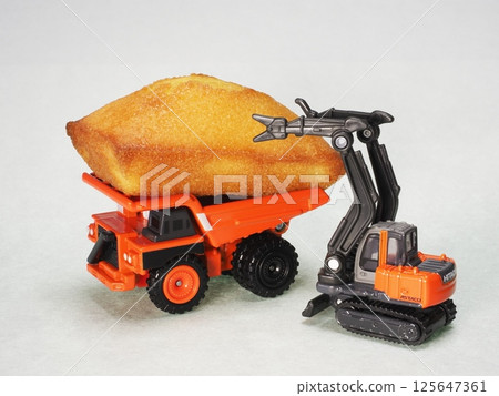 圍著糖果的建築機械 圍著糖果的建築機械 125647361