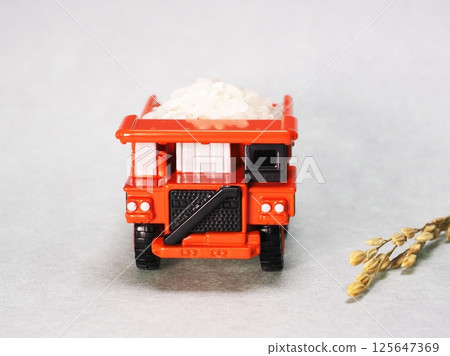 Dump truck carrying rice Dump truck carrying rice 125647369