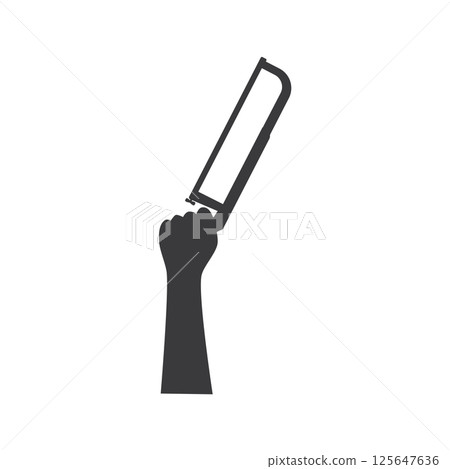 hand holding a saw. hand holding a saw. 125647636