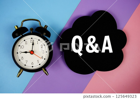 Q&A (Question and Answer) text motivational and inspiration quote with alarm clock on blue, purple and pink geometric background Q&A (Question and Answer) text motivational and inspiration quote with alarm clock on blue, purple and pink geometric background 125649323