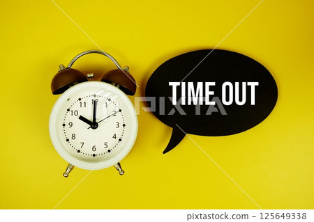 Time Out text text on speech bubble top view on yellow background Time Out text text on speech bubble top view on yellow background 125649338