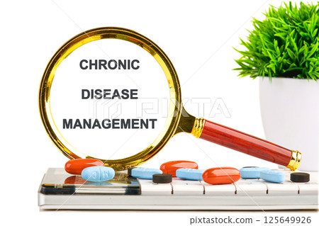 A magnifying glass highlights the words chronic disease management, surrounded by colorful pills and a vibrant plant, symbolizing the integration of healthcare and technology A magnifying glass highlights the words chronic disease management, surrounded by colorful pills and a vibrant plant, symbolizing the integration of healthcare and technology 125649926