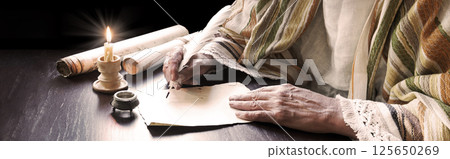 Male hand witn big quill 125650269