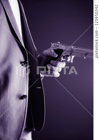 Retro secret agent gun 125650342