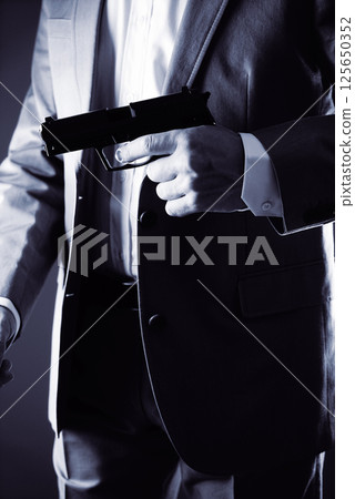 Retro secret agent gun Retro secret agent gun 125650352