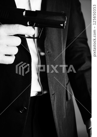 Retro secret agent gun 125650353