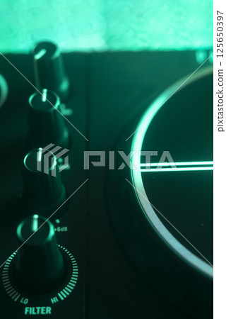 Dj turntables in nightclub Dj turntables in nightclub 125650397