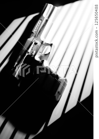 Pistol gun crime thriller Pistol gun crime thriller 125650488