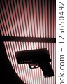 Pistol gun crime thriller 125650492