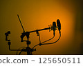 Voiceover actor studio microphone 125650511
