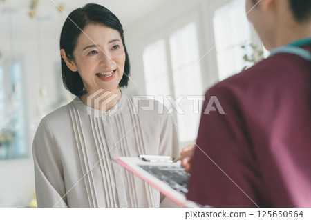 Female patient in her 50s 125650564