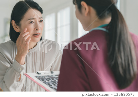 Female patient in her 50s 125650573