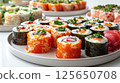 Side view of a vibrant sushi arranged in rows, showcasing an array of colorful rolls and nigiri adorned with fresh fish, avocado, and colorful ingredients 125650708