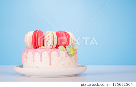 A beautifully decorated cake adorned with colorful macarons A beautifully decorated cake adorned with colorful macarons 125651504