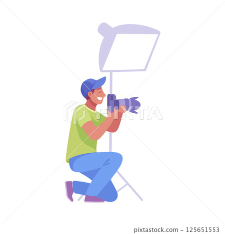 A skilled photographer captures moments with specialized equipment, creating lasting memories A skilled photographer captures moments with specialized equipment, creating lasting memories 125651553
