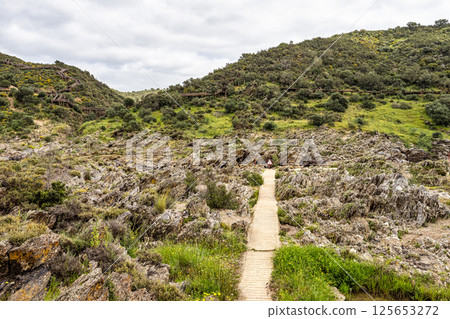 The Leap of the wolf, Pulo do Lobo waterfall in the Guadiana Valley Natural Park at Mertola, Portugal The Leap of the wolf, Pulo do Lobo waterfall in the Guadiana Valley Natural Park at Mertola, Portugal 125653272