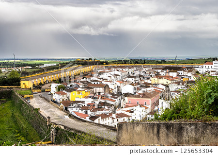 View over Elvas in Portugal with its typical Portuguese buildings and cobblestone streets 125653304