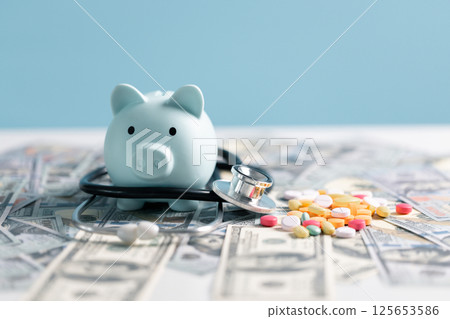 Medical business, a doctor carefully manages the money for each dose of medication, ensuring that even narcotic prescriptions are given against a backdrop of responsible health care. medicine, money. Medical business, a doctor carefully manages the money for each dose of medication, ensuring that even narcotic prescriptions are given against a backdrop of responsible health care. medicine, money. 125653586