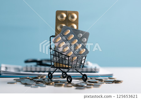 Saving money on health care can be challenging, but with proper insurance, you can manage the cost of medicine and pills while navigating the pharmaceutical business and maintaining your health. Saving money on health care can be challenging, but with proper insurance, you can manage the cost of medicine and pills while navigating the pharmaceutical business and maintaining your health. 125653621