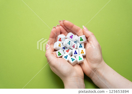 Cubes with people in palms. Human resources department. Recruitment and management of employees. Employee selection, and team building. Organizational control, talent acquisition, and HR strategy. 125653894