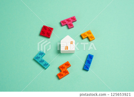 House and puzzles of interest and initial mortgage payments. Discounts and installments. Home financing, interest rates, mortgage down payments, and real estate discounts. Favorable terms House and puzzles of interest and initial mortgage payments. Discounts and installments. Home financing, interest rates, mortgage down payments, and real estate discounts. Favorable terms 125653921