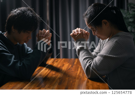 In moment of meditation, the congregation began praying and praising, seeking the grace and forgiveness of the Holy Spirit, as they embraced the spirit of fellowship and the teachings of the gospel. In moment of meditation, the congregation began praying and praising, seeking the grace and forgiveness of the Holy Spirit, as they embraced the spirit of fellowship and the teachings of the gospel. 125654778