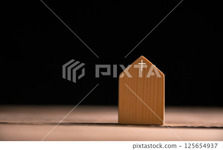 Church with its cross symbolizing Jesus Christ, stands as holy building where community gathers in faith and belief to worship God. church, cross, jesus christ, belief, community, estate, faith, god. 125654937