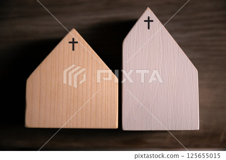 Church with its cross symbolizing Jesus Christ, stands as holy building where community gathers in faith and belief to worship God. church, cross, jesus christ, belief, community, estate, faith, god. 125655015