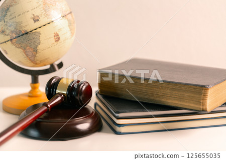 In court lawyer cited book of law as judge, holding gavel, pronounced judgement with authority of legal justice, determining punishment to be auctioned. responsible, regulation, prosecution, integrity In court lawyer cited book of law as judge, holding gavel, pronounced judgement with authority of legal justice, determining punishment to be auctioned. responsible, regulation, prosecution, integrity 125655035