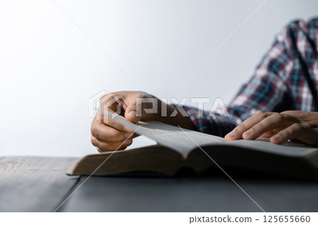 Christian life crisis prayer to god. Woman Pray for god blessing to wishing have a better life. woman hands praying to god with the bible. begging for forgiveness and believe in goodness. 125655660