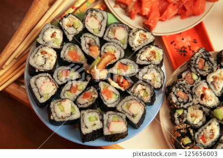 table with a set of rolls and sauce table with a set of rolls and sauce 125656003