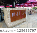 The Hawaii_Mai Tai Bar and pink umbrellas 125656797