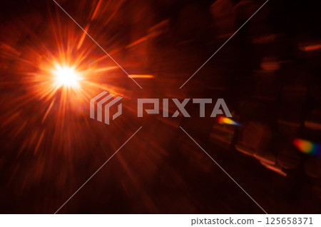 Sun flare on the black background Sun flare on the black background 125658371