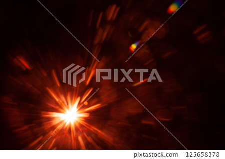 Sun flare on the black background 125658378