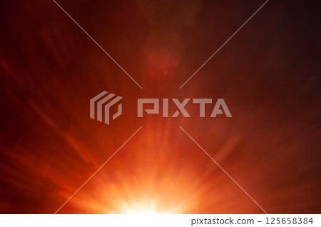Sun flare on the black background 125658384