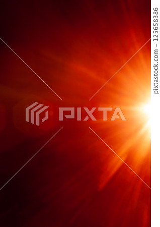 Sun flare on the black background 125658386