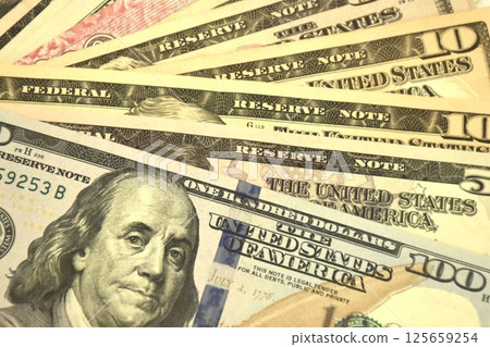 variety value of US dollar banknote arranging on white background variety value of US dollar banknote arranging on white background 125659254