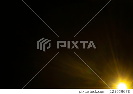 Sun flare on the black background 125659678