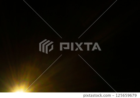 Sun flare on the black background 125659679