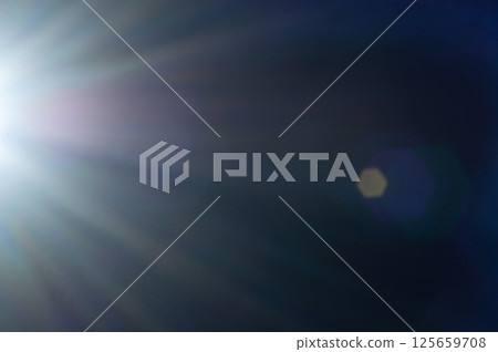 Sun flare on the black background Sun flare on the black background 125659708