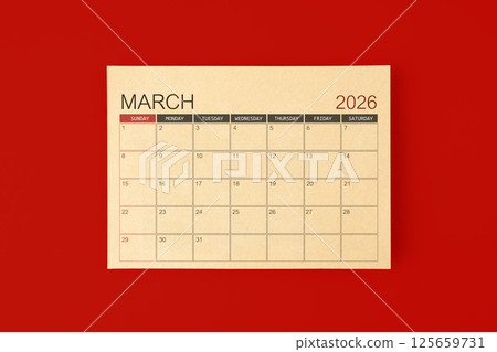 March 2026 desk calendar made from brown paper page on red background. March 2026 desk calendar made from brown paper page on red background. 125659731