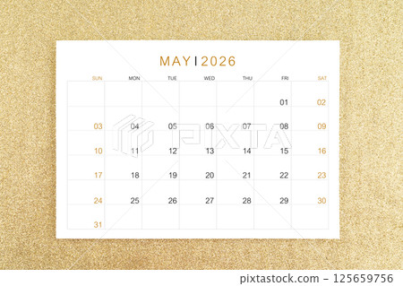 May 2026 calendar page on gold glitter background. May 2026 calendar page on gold glitter background. 125659756
