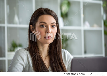 Confident businesswoman in casual office 125661135