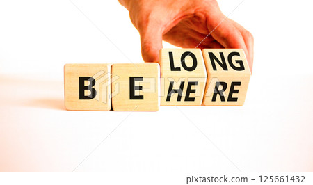 Belonging and belong symbol. Concept words Be here Belong on beautiful wooden block. Beautiful white background Businessman hand. Business motivational belonging and belong concept. Copy space. Belonging and belong symbol. Concept words Be here Belong on beautiful wooden block. Beautiful white background Businessman hand. Business motivational belonging and belong concept. Copy space. 125661432