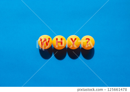 Why question symbol. Concept word Why question on beautiful yellow ping pong balls. Beautiful blue table blue background. Business, lifestyle, support and why question concept. Copy space. Why question symbol. Concept word Why question on beautiful yellow ping pong balls. Beautiful blue table blue background. Business, lifestyle, support and why question concept. Copy space. 125661478